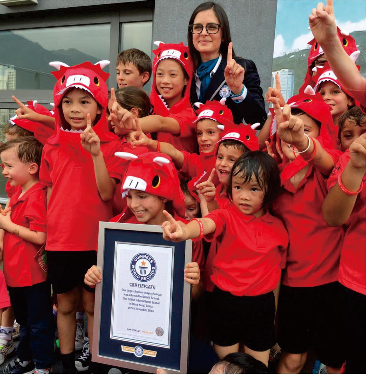 Kellett School students and staff celebrating with the Guinness World Record certificate