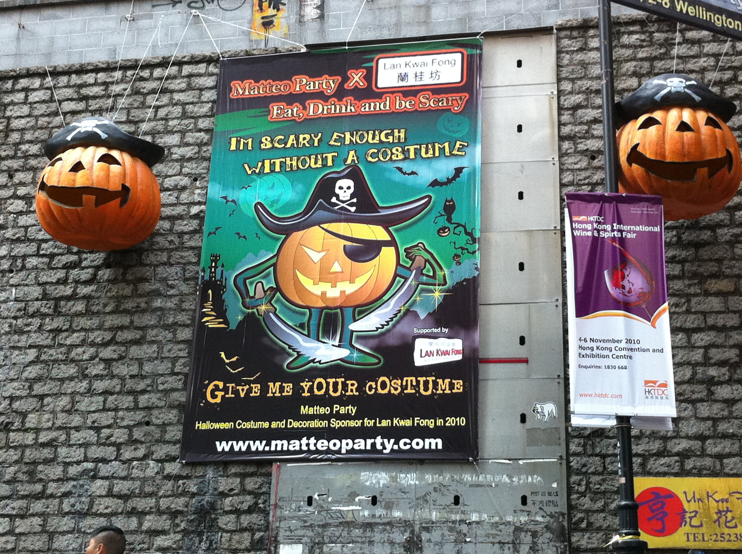 Lan Kwai Fong streetscape banners and crowd atmosphere